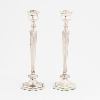 A pair of silver candlesticks, mark of Wing On, Hong Kong around 1930.