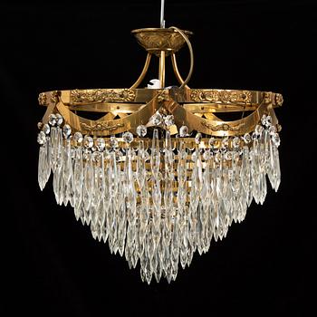 An end of the 20th Century ceiling light with prisms.