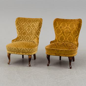 a pair of early 20th century chairs.