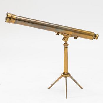 A telescope on a tripod, 19th/20th century.