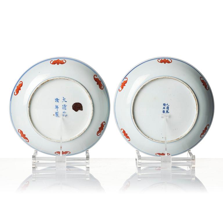 A pair of five clawed dragon dishes, Qing dynasty with Qianlong mark.