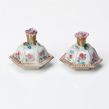 A pair of famille rose vases with covers, Qing dynasty, Qianlong (1736-95).