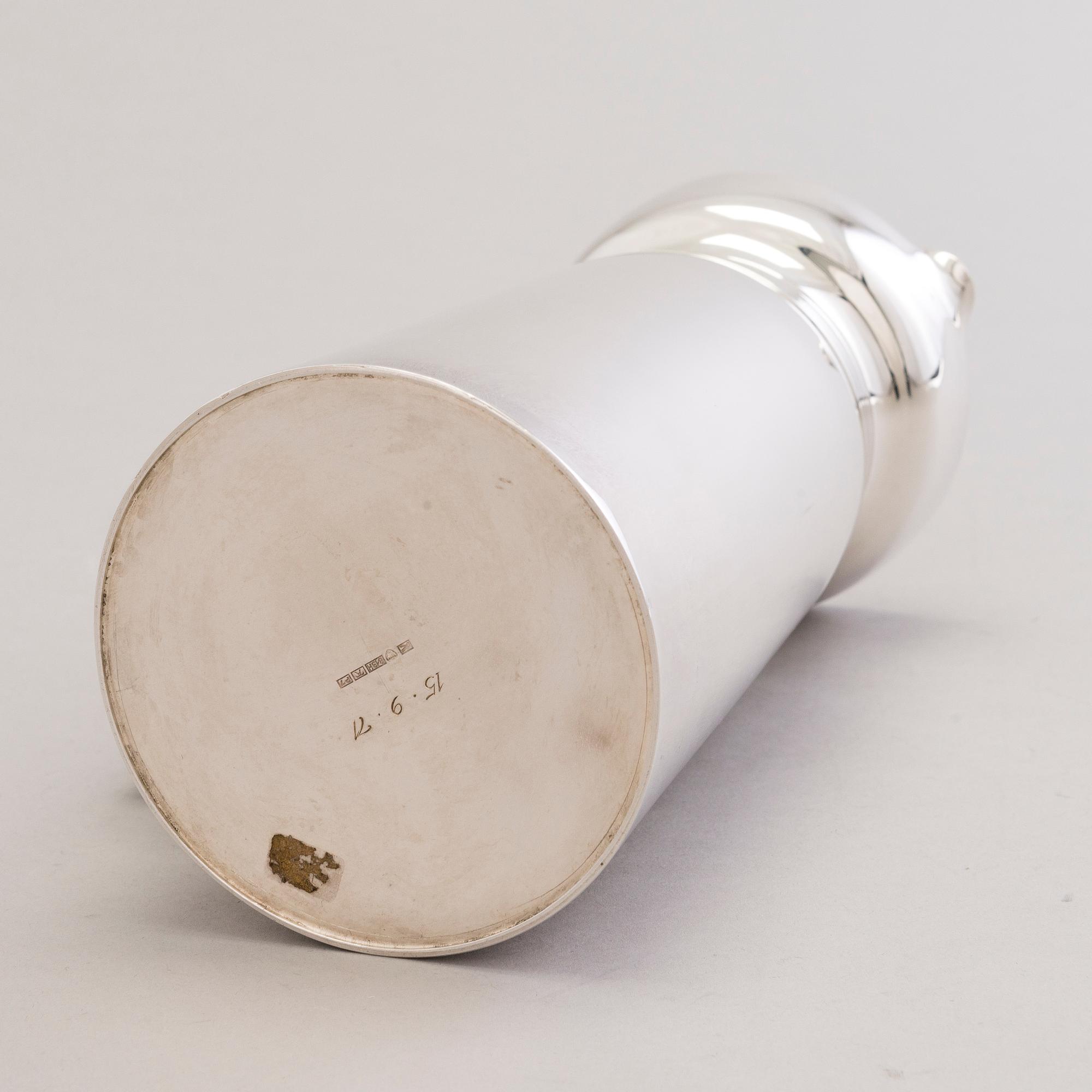 A 1960s silver jug with hardwood handle, Kultateollisuus, Turku Finland 1968.