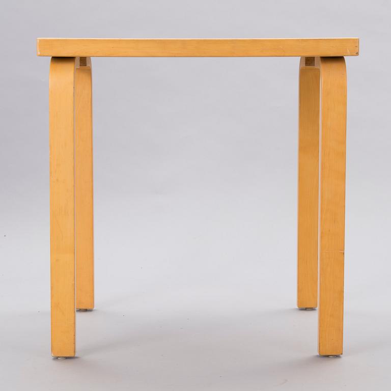 A mid-20th Century table, Artek.