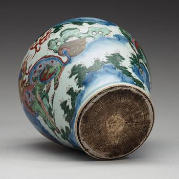 A Transitional Wucai jar, 17th Century.