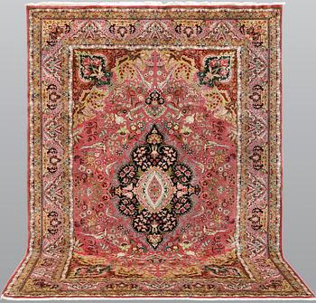 A Tabriz carpet, part silk, 50 Raj count, c. 290 x 200 cm.