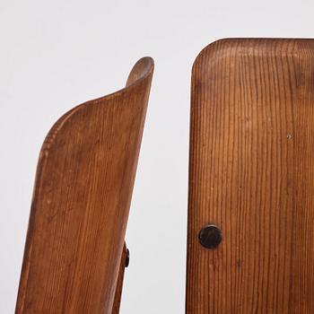 Axel Einar Hjorth, a set of four "Lovö" stained pine chairs, Nordiska Kompaniet 1930s.