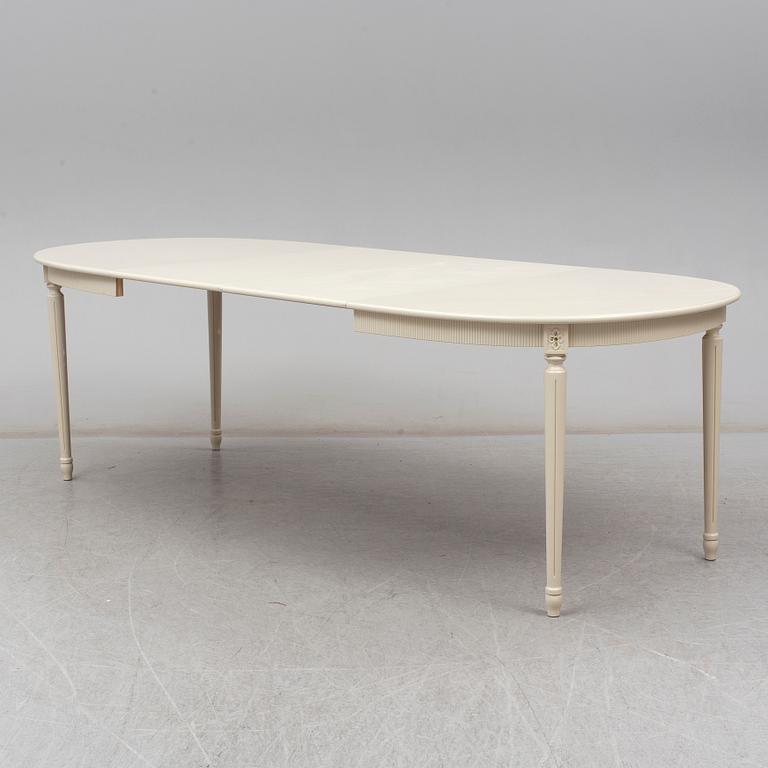 A second half of the 20th century Gustavian style dining table.