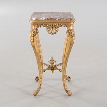 A rococo style side table, around the year 1900.