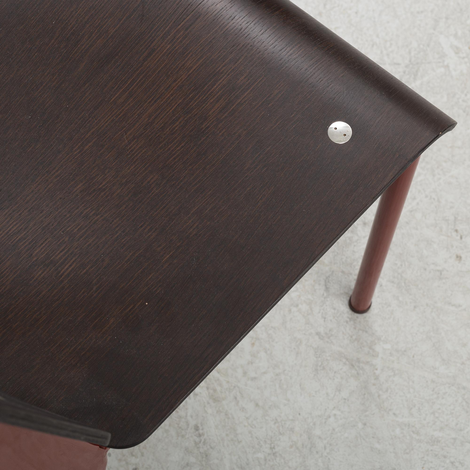 A Standard chair by Jean Prouvé for Vitra, dated 2002.