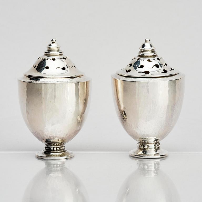 Georg Jensen, a pair of silver casters, design Johan Rohde, Copenhagen 1915-1921.