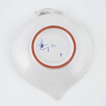 Stig Lindberg, five earthenware dishes and a bowl, Gustavsberg Studio, Sweden.