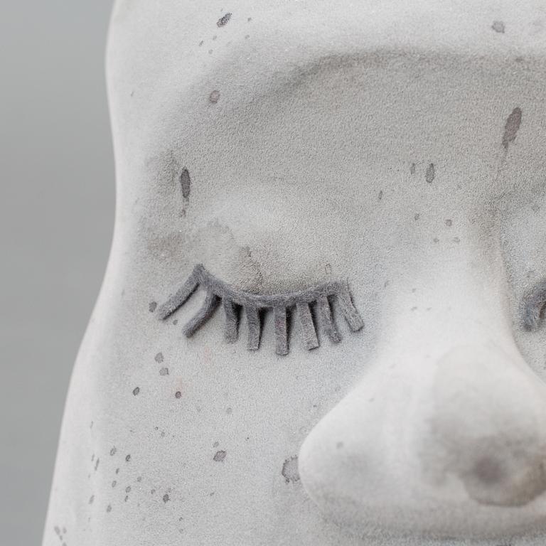 A stone head figure made by JoAnn Tan Studio for NK 2016.