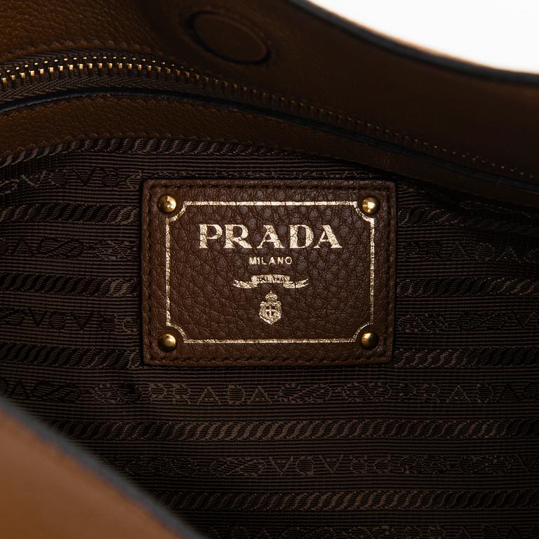 Prada, a "Vitello Phenix" leather bag.