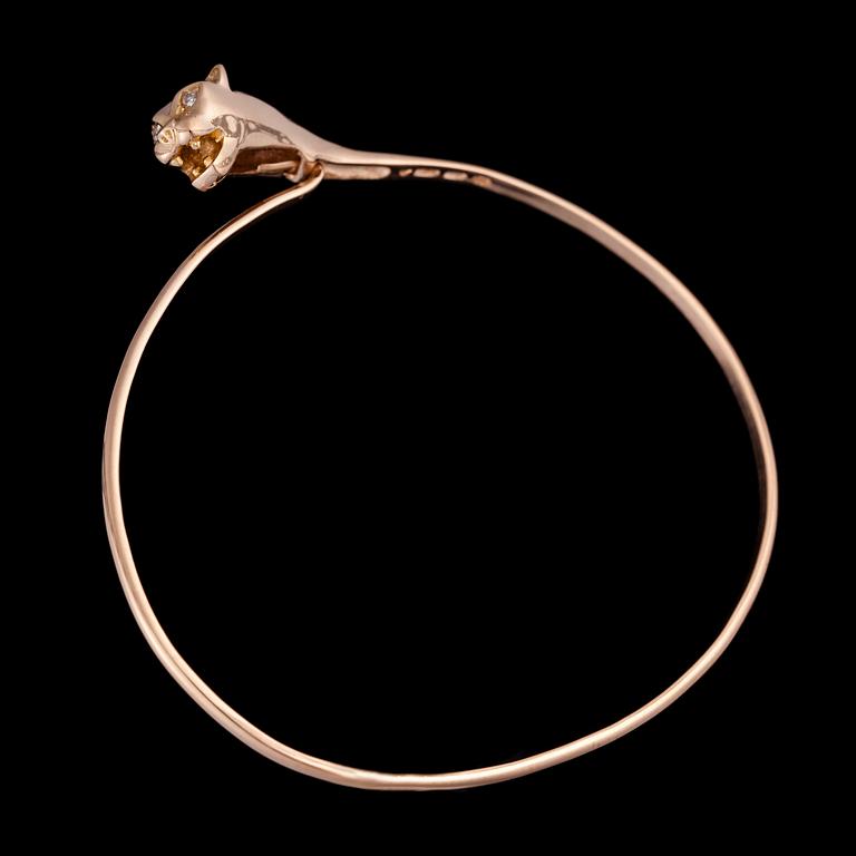 ARMRING samt RING, 14K guld, små diamanter. Finska stämplar, Timo Nupponen, Helsingfors. Totalvikt 11 g.