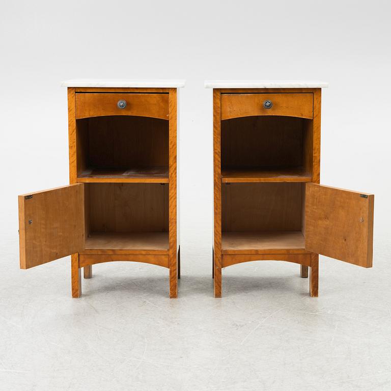 A pair of early 20th century bedside tables.