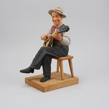 HERMAN ROSELL, träfigur, signerad och daterad 1949.