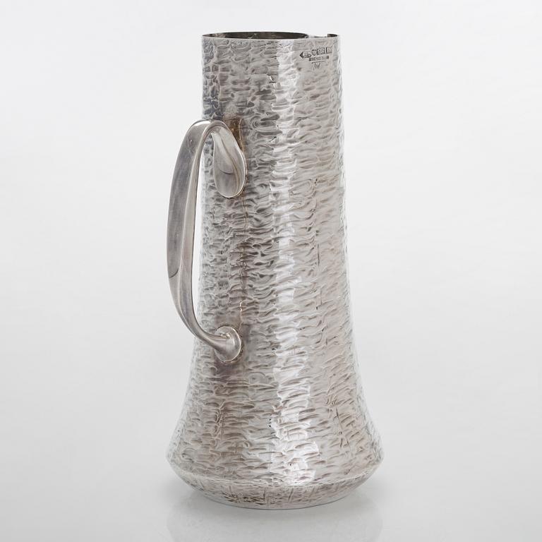 Tapio Wirkkala, a sterling silver pitcher with eight beakers, Hämeenlinna Finland 1973-1978.