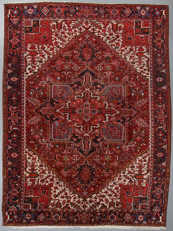A carpet, semi-antique/old Heriz, ca 340 x 256 cm.