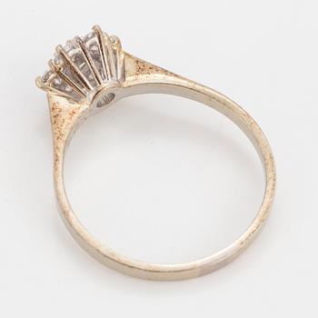 CLUSTER RING, 18K white gold with 7 diamonds 0.54 cts, according to engraving.