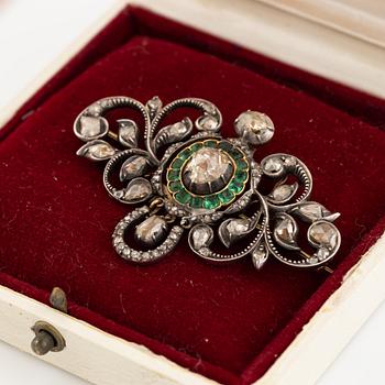 Gold and silver with rose cut diamond and emerald brooch.