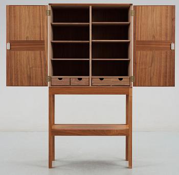 A Johan Kandell walnut cabinet by Källemo AB, Värnamo.