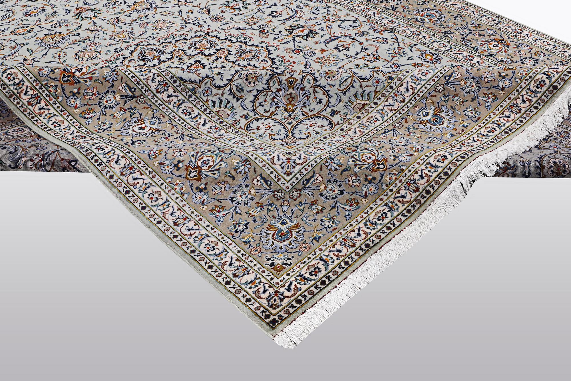 A carpet, Kashan, signed Fani, ca 420 x 300 cm.