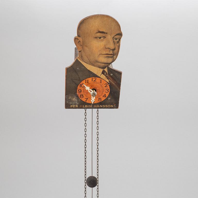 A wall clock bearing the portrait of Per Albin Hansson, first half of the 20th century.