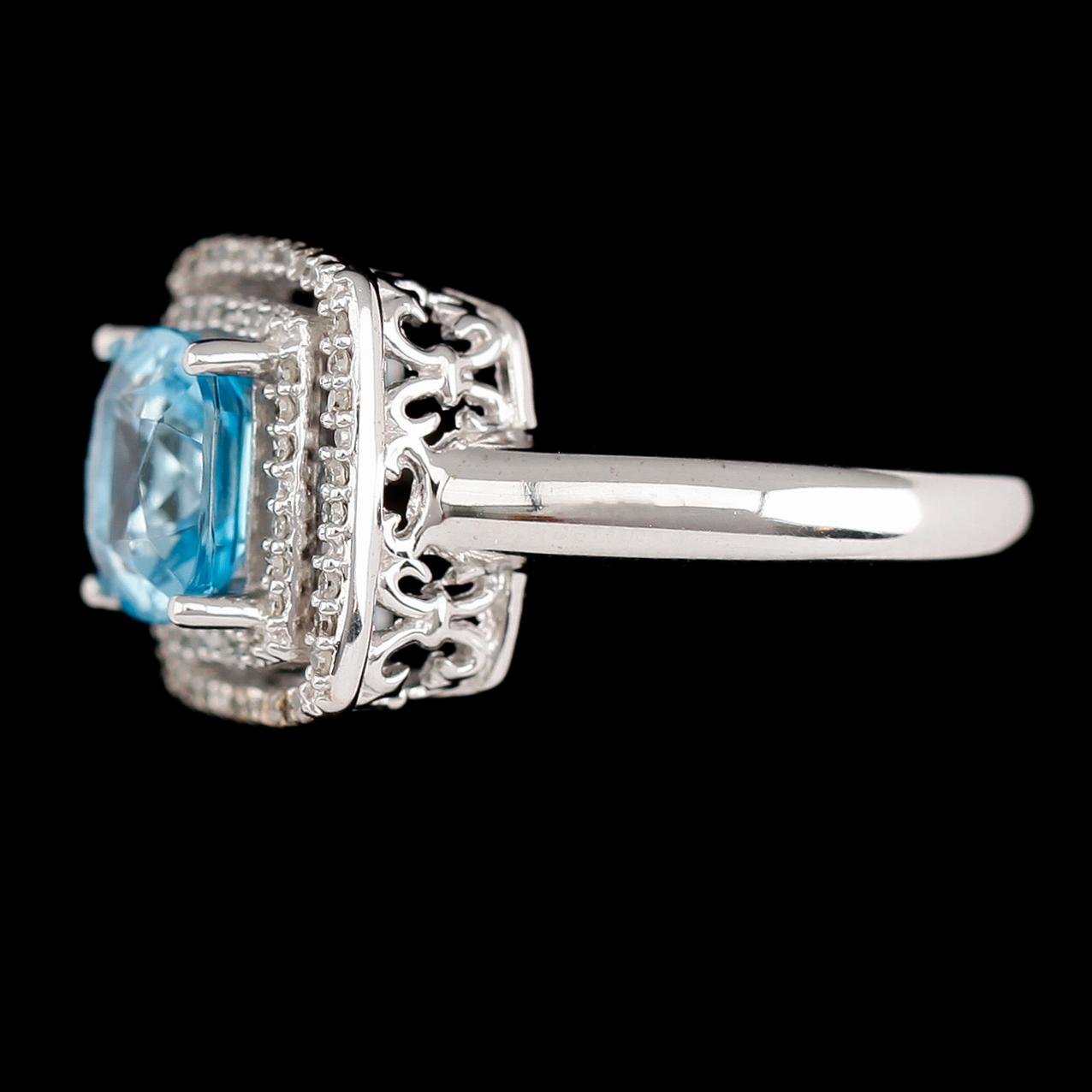 RING, 14 k vitguld, blå topas, diamanter tot ca 0.17 ct.