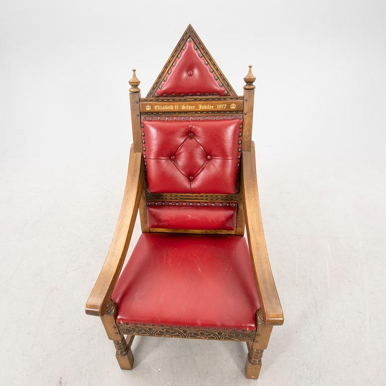 A oak and leather throne commemorating Elizabeth II silver jubilee 1977 by Wood Bros. Ltd.
