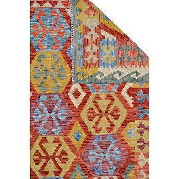 A carpet, kilim, ca 304 x 210 cm.