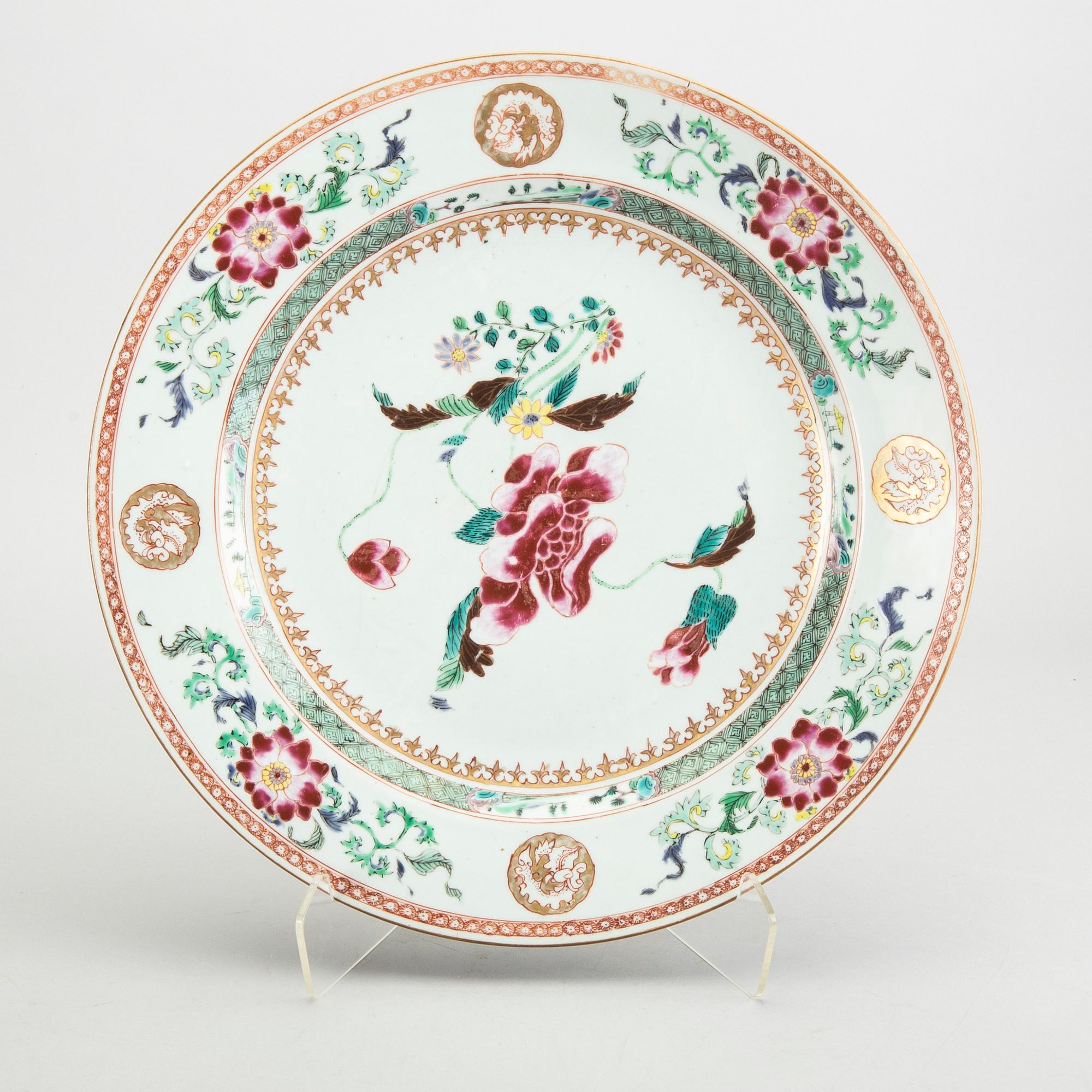 A Chinese Qianlong porcelain plate and dish in famille rose colours.