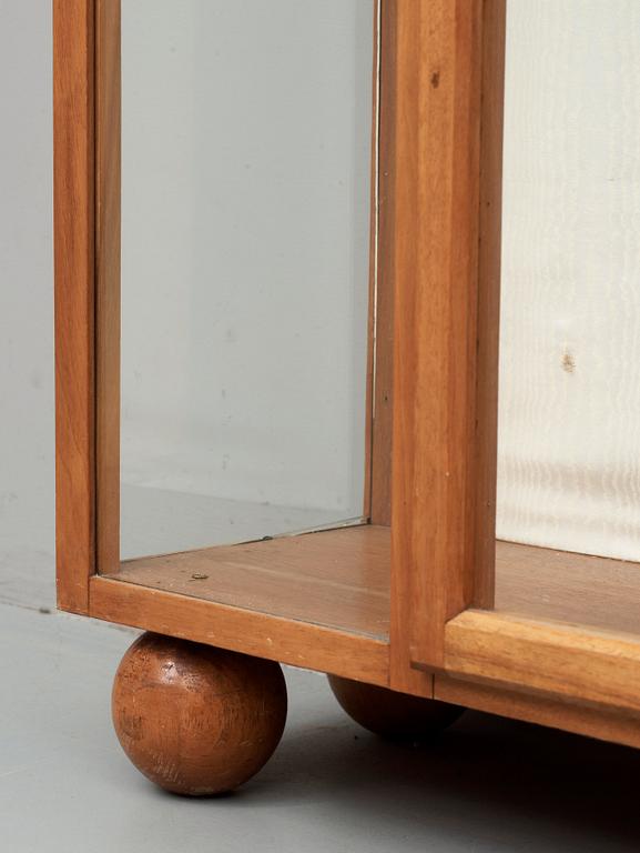 A Josef Frank mahogany showcase cabinet, a version of model 2077, by Svenskt Tenn.