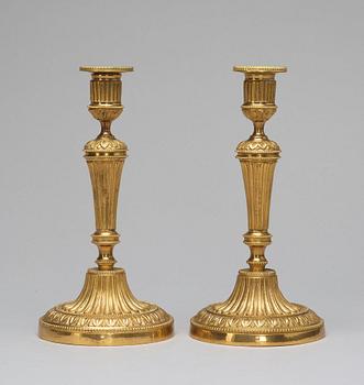 A pair of candlesticks, Louis XVI-style, circa 1900.