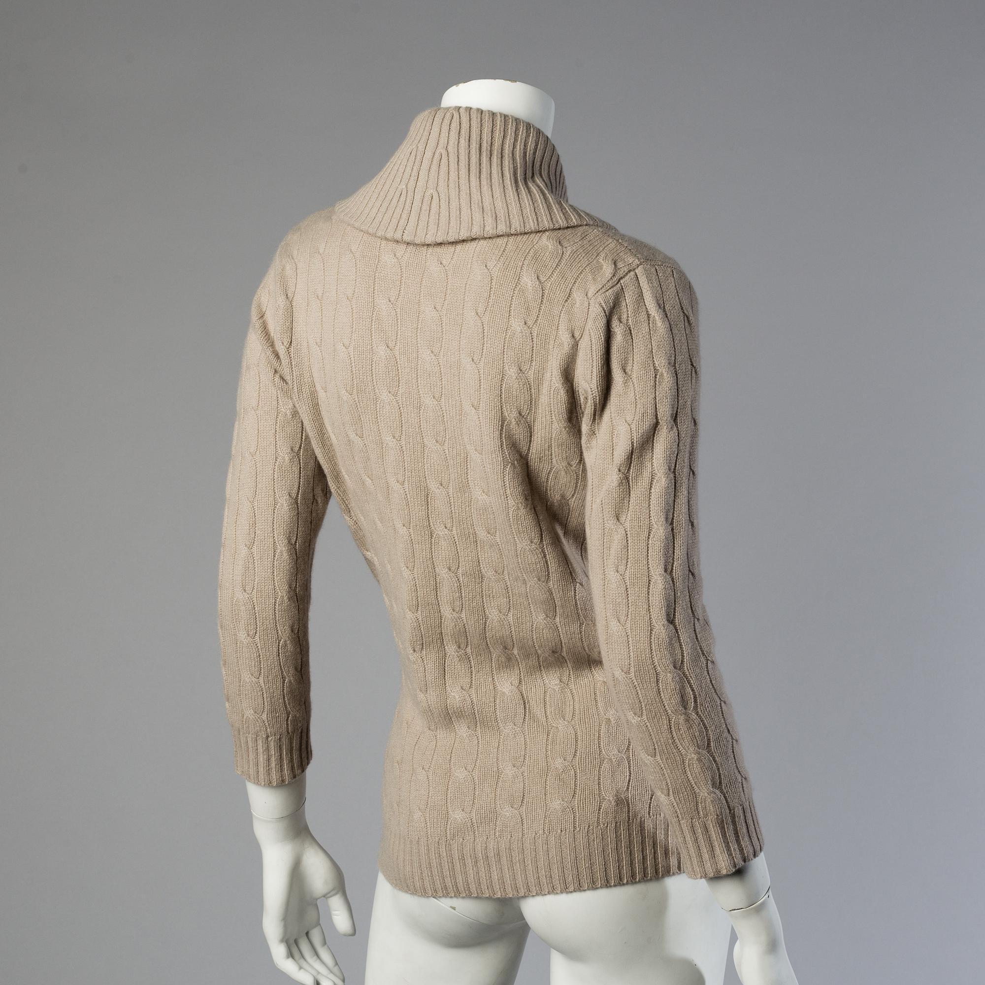 Three sweaters by Ralph Lauren.