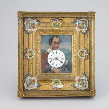 A Schwarzwald area wall pendulum clock with mechanical eye-movment, mid 19thcentury.