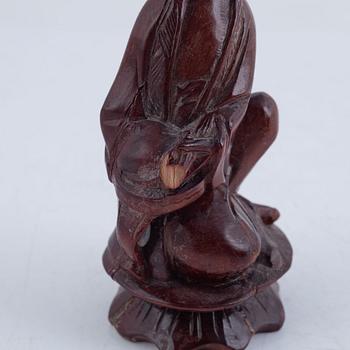 Six Chinese carved wooden figurines, 20th century.