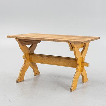 A pianted trestle table, 19th Century.