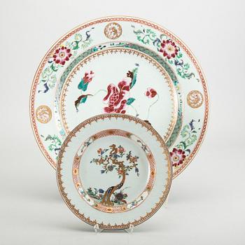 A Chinese Qianlong porcelain plate and dish in famille rose colours.