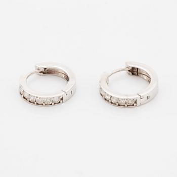 Brilliant-cut diamond  hoop earrings.