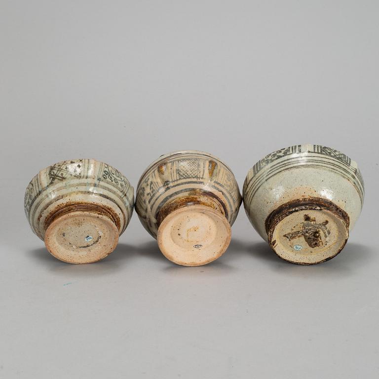 A set of three Sawankhalok boxes with covers, 15th / 16th Century.