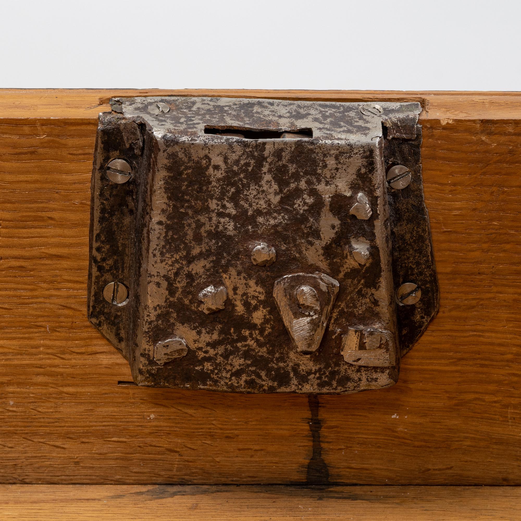 A baroque style oak chest, around 1900.