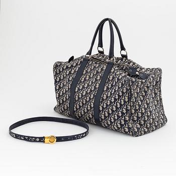 Christian Dior, a canvas 'Speedy' weekendbag and belt, size 85.