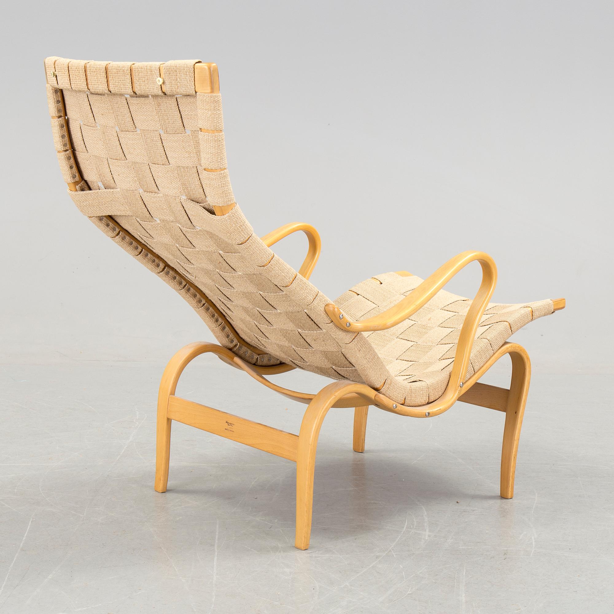 A BRUNO MATHSSON "PERNILLA 2, T. 107" BEECH AND WEBBING ARMCHAIR, Firma Karl Mathsson, Värnamo, Sweden, 1981.