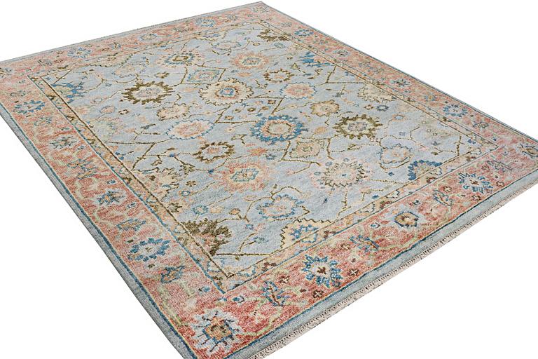 An oriental carpet with Mamluk design, c. 302 x 252 cm.