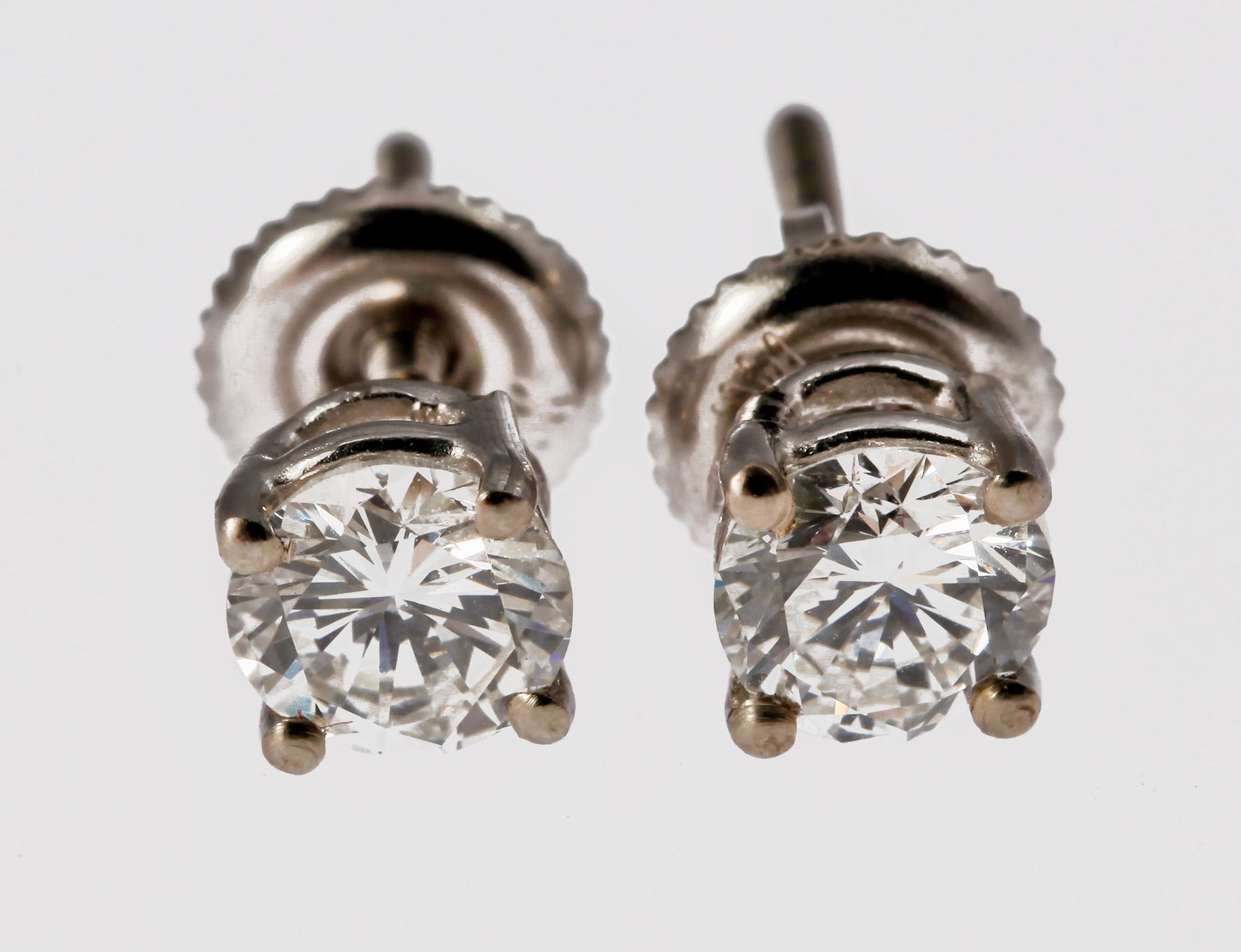 EARRINGS, 14 K gold med brilliant cut diamonds, tot 0.53 ct.