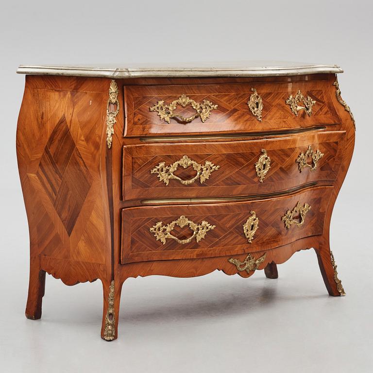 A Swedish rococo rosewood and gilt brass-mounted commode, later part of the 18th century.