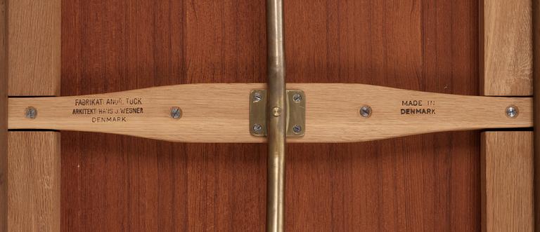 A Hans J Wegner teak and oak sabre leg dinner table by Andreas Tuck, Denmark 1950-60's.