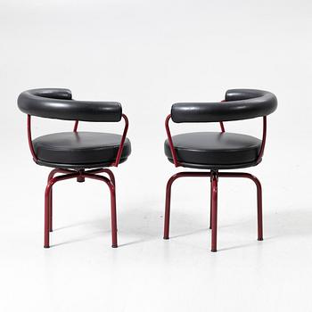 Charlotte Perriand, /Le Corbusier, swivel armchairs, a pair, model LC7, Cassina, Italy, latter half of the 20th century.