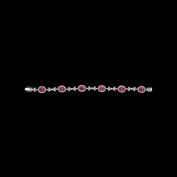 1009. A pink tourmaline and brilliant cut diamond bracelet, tot. 1.77 cts.
